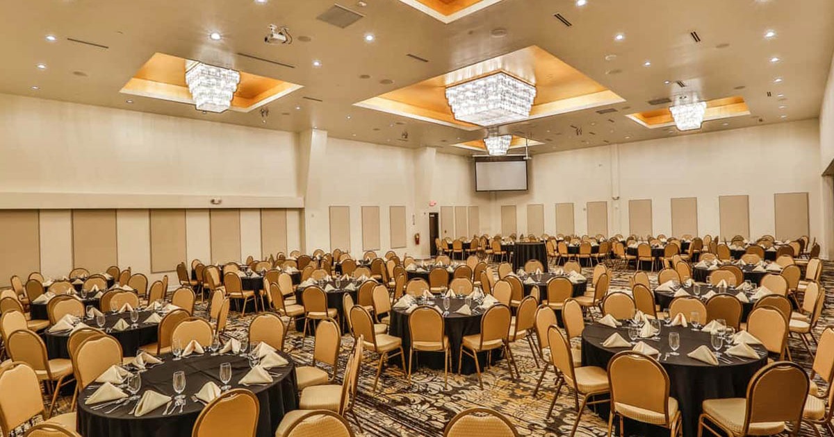 A large, elegantly set banquet hall at the Sankranti Indian Restaurant & Banquets