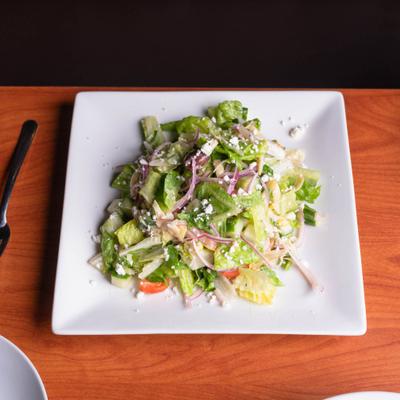 Plate of Greek Salad served on the table.