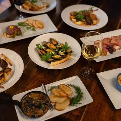 Miscellany of food dishes displayed on a table.