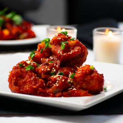 Cauliflower florets and peppers in a soy-tomato glaze.