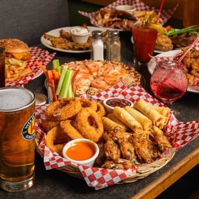Assorted dishes and drinks arranged on a table.