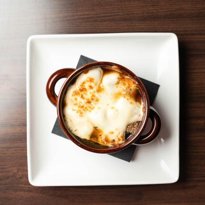 Top-down view of French onion soup.