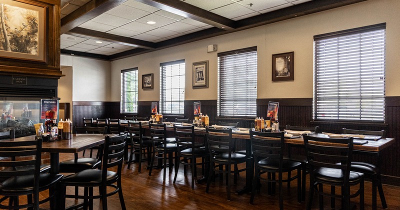 Interior, seating area with a long table and chairs