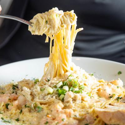 RIPS Seafood Pasta-- shrimp & crabmeat in a white cream sauce 0ver angel hair pasta.