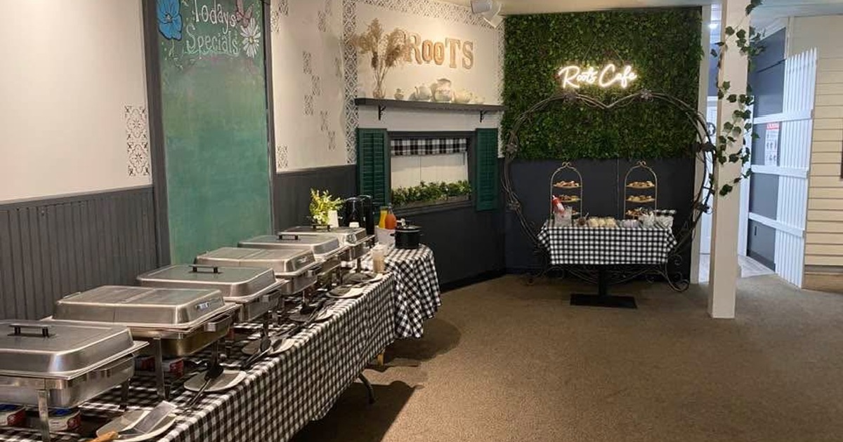 Catering setup with a buffet station with chafing dishes for hot food