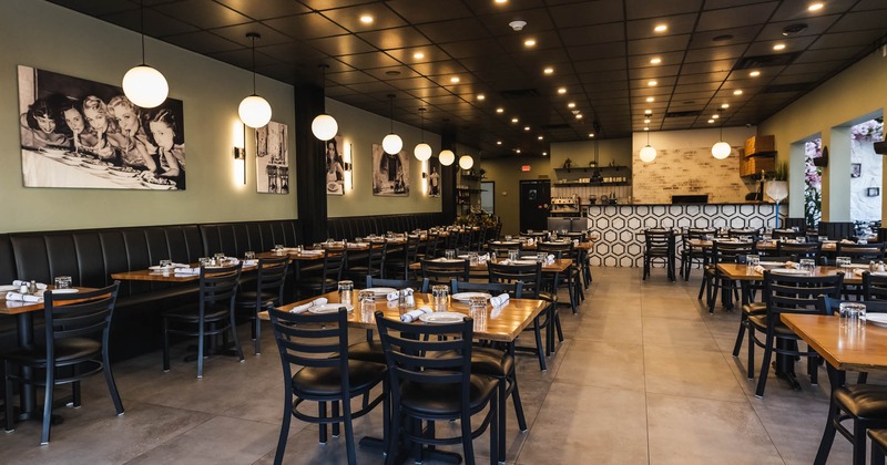 Interior, tables, chairs and leather, high back benches lined up