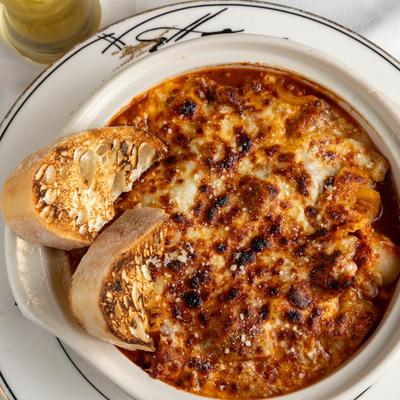 Sausage and peppers, served, top view.