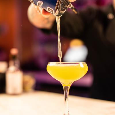 Bartender pouring a drink