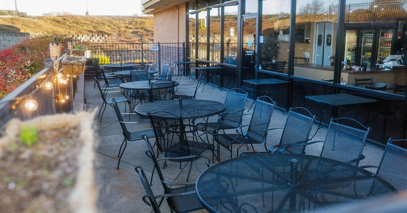 Exterior, tables and chairs all lined up