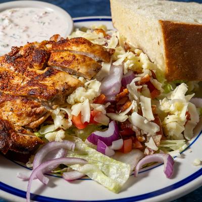 Grilled Cajun Chicken Salad plate, close up.