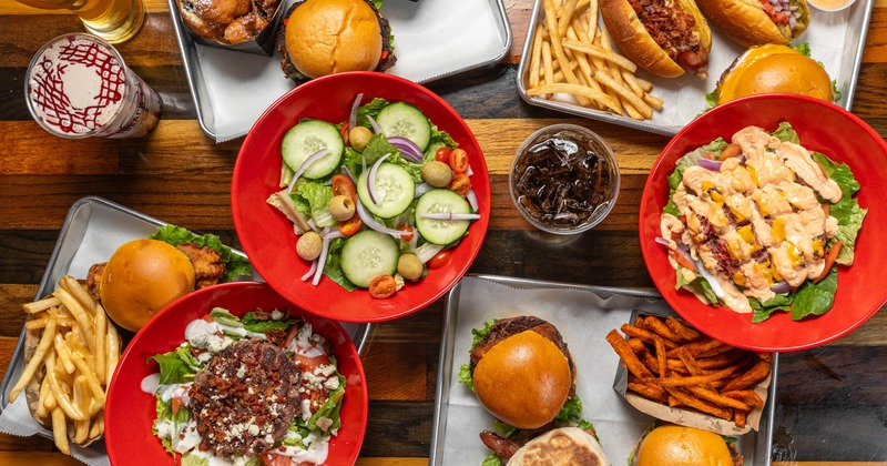 Assortment of food plates and drinks, flat lay