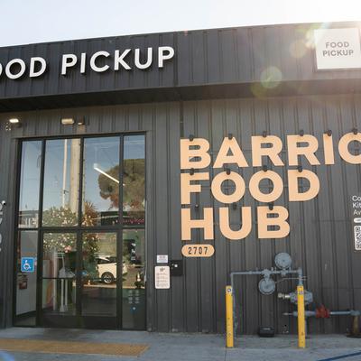 Storefront with entrance and a sing.