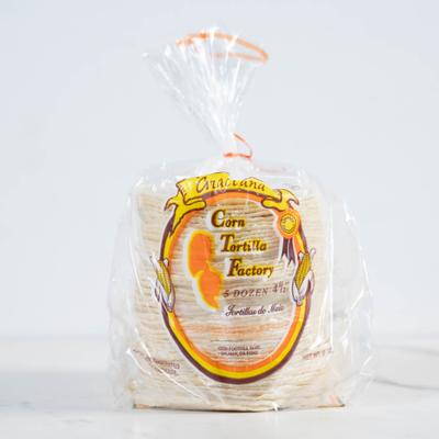 Packaged corn tortillas in a plastic bag.