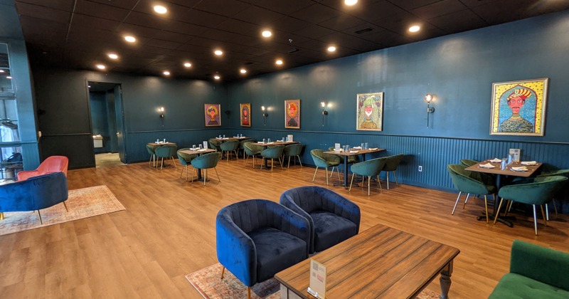 Interior, lined up tables with tableware
