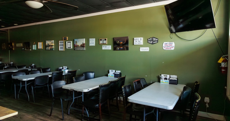 Interior seating area with chairs and tables