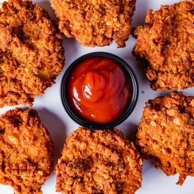 Chicken nuggets with a side of BBQ sauce