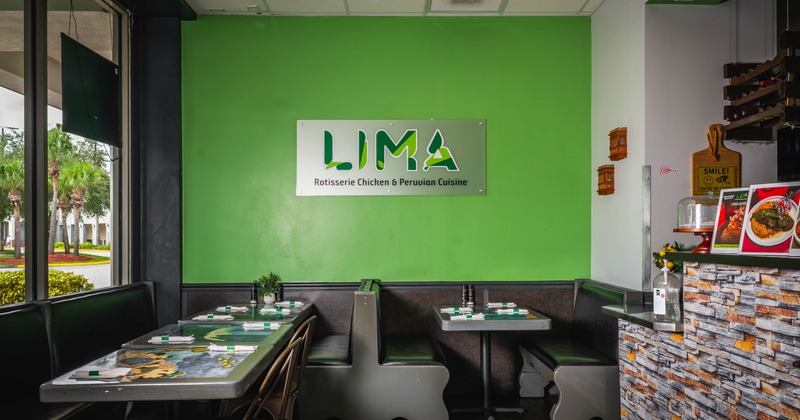 Interior, tables with napkins, prominent sign