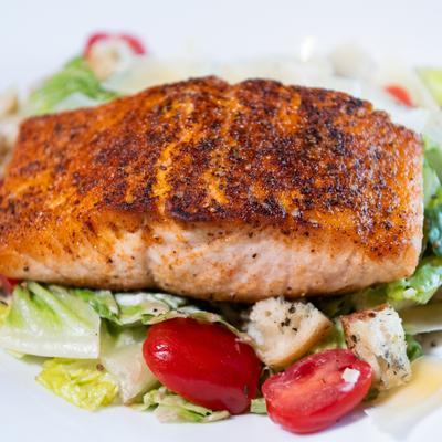 Salmon Caesar Salad, close-up.