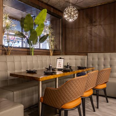 Interior, Cozy seating with a table set up for dining.