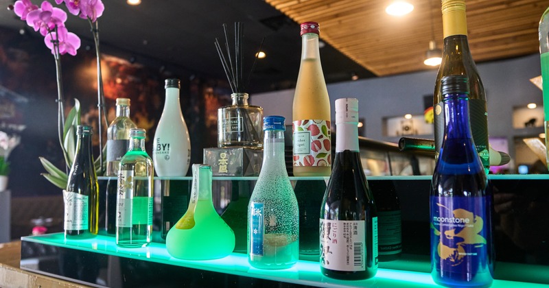Drink bottles on the bar shelf