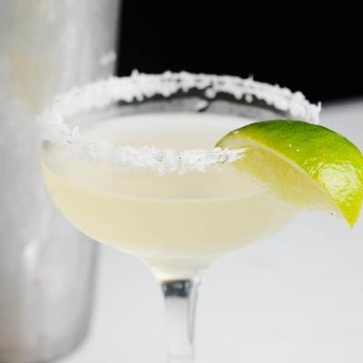 Margarita with a lime wedge