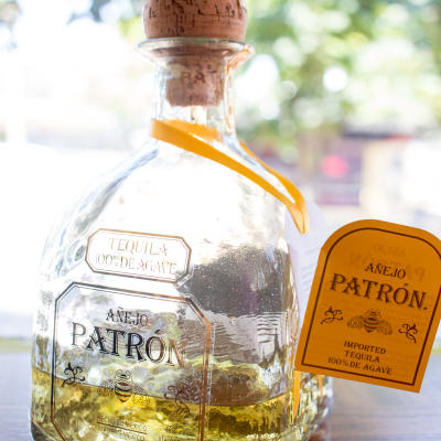 A half full Patron tequila botte.