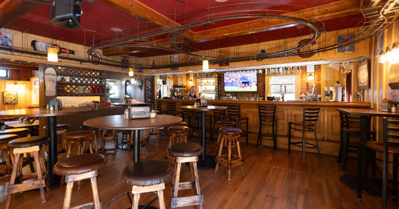 Interior, seating area with a bar in the back