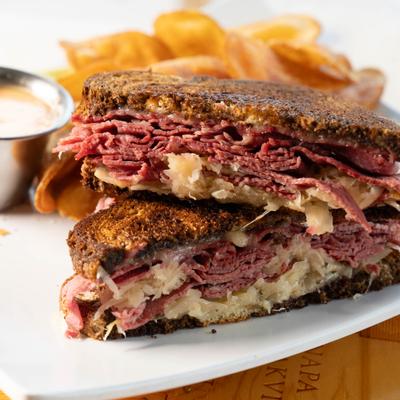 Reuben sandwich, served, closeup, front view.