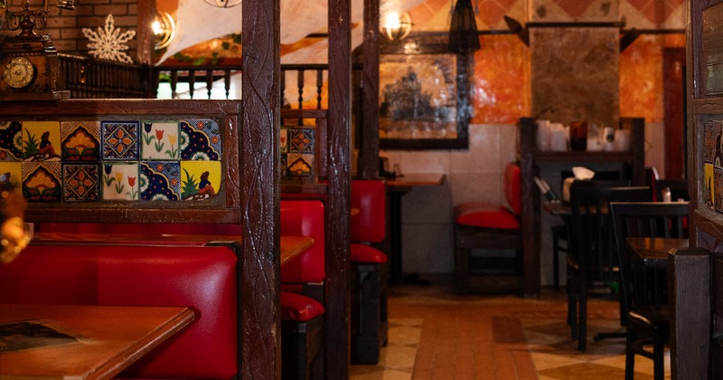Interior, tables and red leather booths