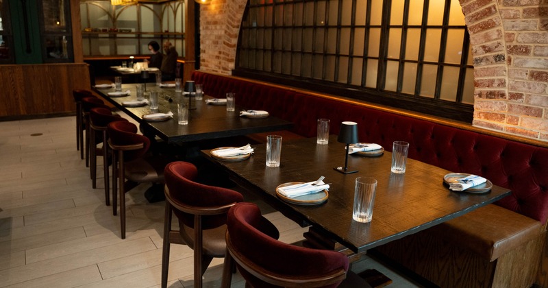 Interior, set tables and chairs ready for guests