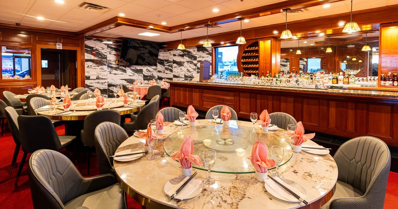 Round dining table ready for guests