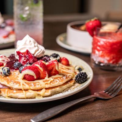 Berries Mascarpone pancakes served with various other desserts.