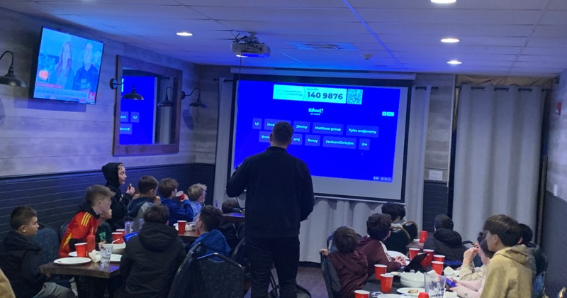Children listening to a presentation