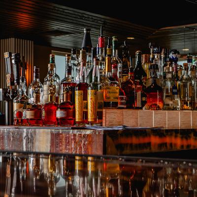 Liquor bottles at the back bar.