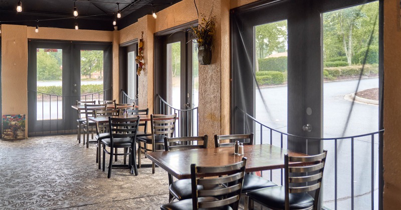 Dining tables by the big windows