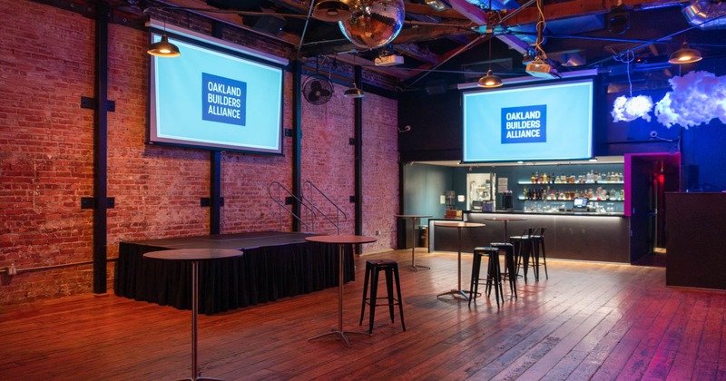 Interior, a stage with a bar in the right side