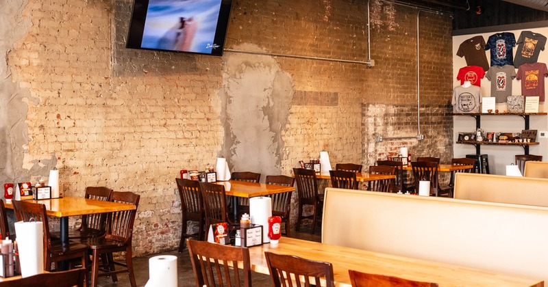 Interior, tables and chaires, tv above