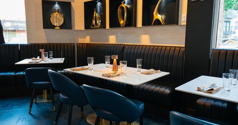 Modern and stylish restaurant interior dining area with set tables