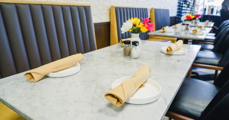 Dining table set for guests, close up