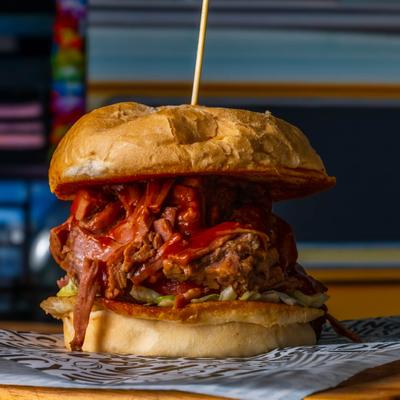 Brisket sandwich with lettuce, tomato, and mayo on toasty bread.