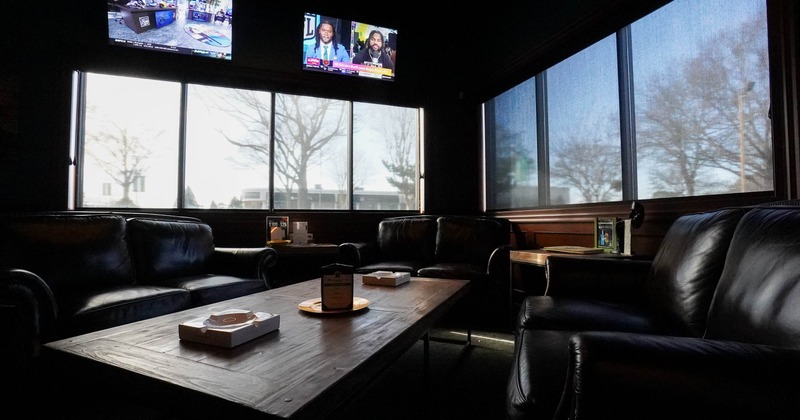 Interior, sofas and table near windows