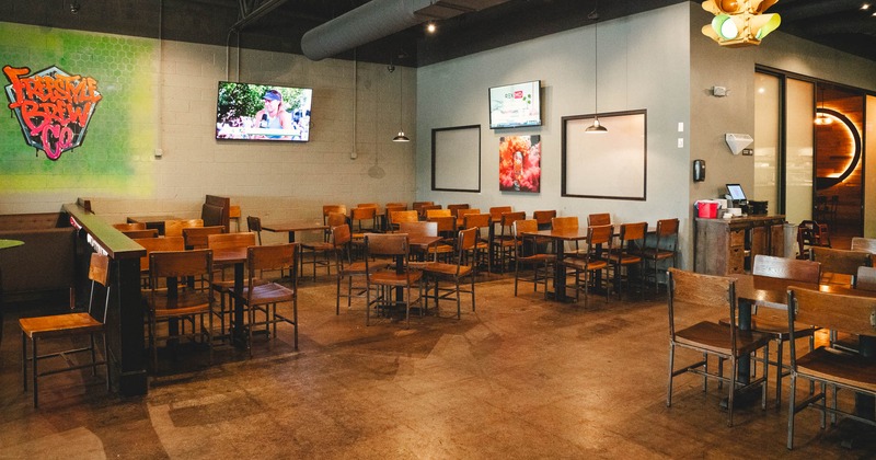 Interior, seating area with wooden chairs and tables