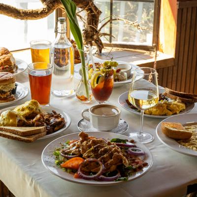 Various food and drinks on the table.
