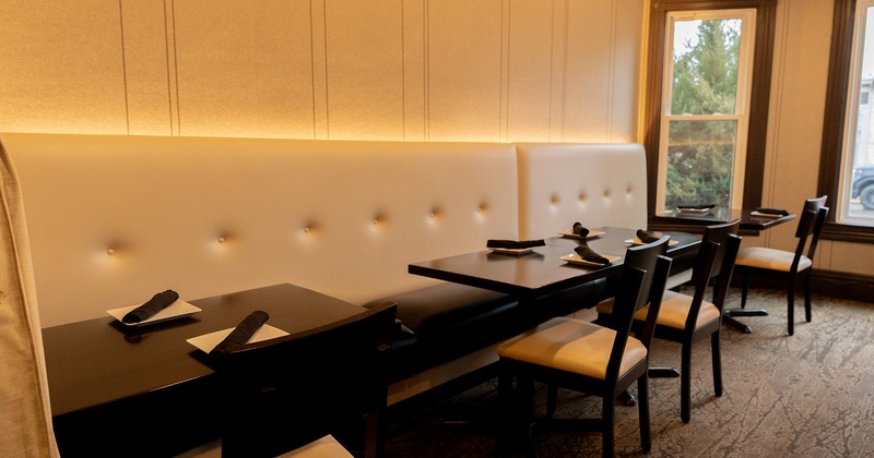 Restaurant interior, cozy dining room with set dining tables