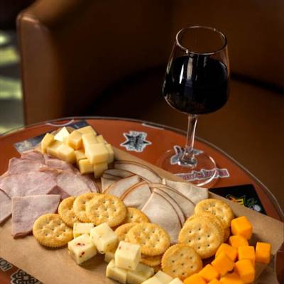 Charcuterie board and red wine.