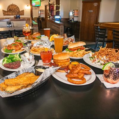 Assorted food and drinks on the table.