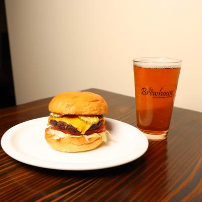 Brewhouse Cheeseburger with fries and a beer.