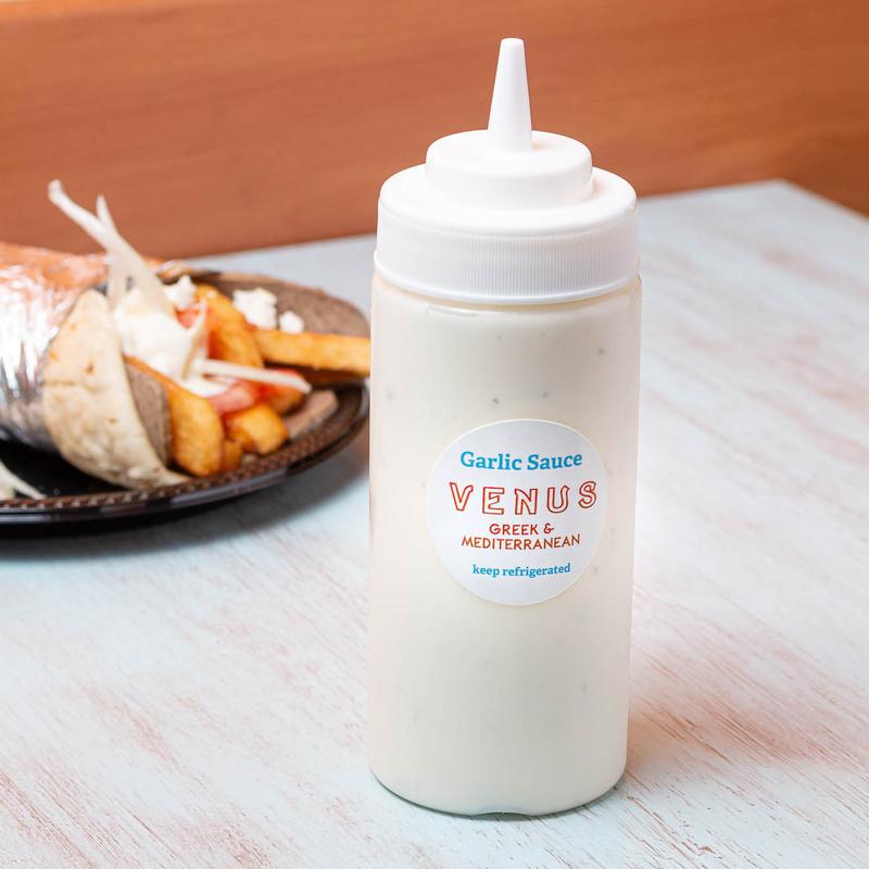 Bottle of Homemade Garlic Sauce photo