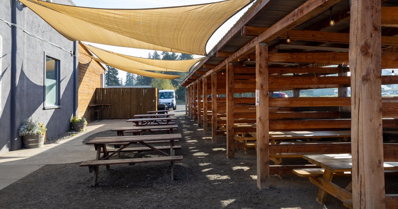 Exterior, patio, tables and benches, parasols