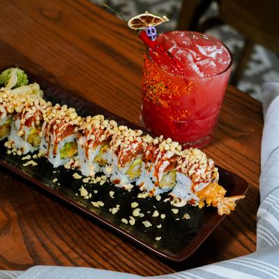 Shrimp tempura sushi rolls, topped with tuna and eel sauce